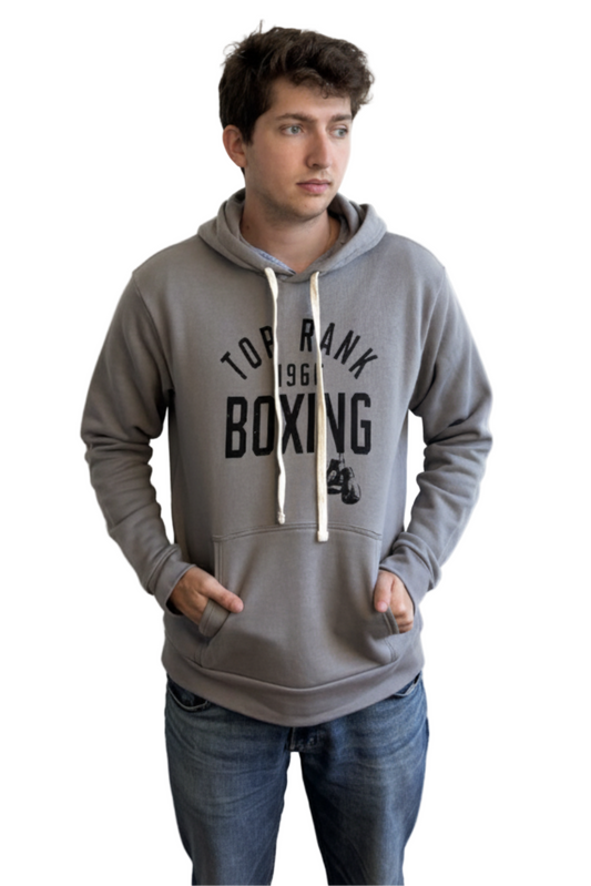 Person wearing a lead grey pullover hoodie with "Top Rank Boxing 1966" printed in white on the front.